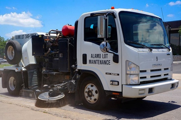 Alamo Lot Maintenance Sweeper Truck on Road